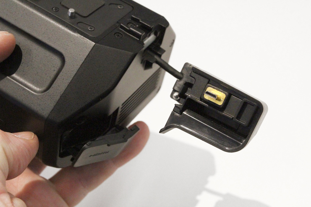 Here's another clue. The small open flap resting on my finger says HDMI. The gold connector to the right is micro HDMI.